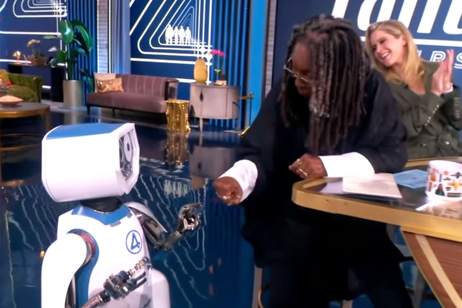 Whoopi Goldberg summons robotic to “The View” set, flirts with it reside on air: ‘Oh, you so recent!’