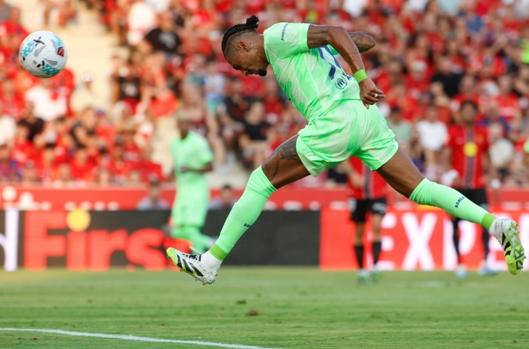 Barcelona open Liga title defence strolling previous nine-man Mallorca